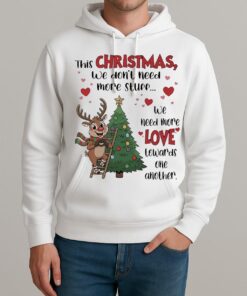 This Christmas We Dont Need More Stuff We Need More Love Premium Unisexhoodie